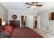 Bedroom with ensuite bathroom access and view of the dining room at 1820 Yates Wheel Way, Raleigh, NC 27606