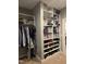 Spacious walk-in closet with custom shelving for optimal storage at 1820 Yates Wheel Way, Raleigh, NC 27606