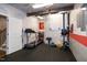 Home gym featuring an area for both cardio and weight training at 1820 Yates Wheel Way, Raleigh, NC 27606