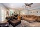 Open-concept basement with recreation and living room and view of wet bar at 1820 Yates Wheel Way, Raleigh, NC 27606