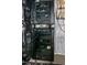 Media room equipment rack featuring multiple devices wired together at 1820 Yates Wheel Way, Raleigh, NC 27606