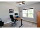 Office with a large window providing natural light and a modern adjustable height desk at 1820 Yates Wheel Way, Raleigh, NC 27606