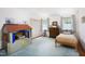 Bright, airy bedroom with a large closet, hardwood floors, and natural light at 19 Oak Dr, Durham, NC 27707