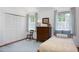 Bright, airy bedroom with a large closet, hardwood floors, and natural light at 19 Oak Dr, Durham, NC 27707