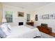 Bright main bedroom with hardwood floors, lots of natural light and vintage trunk at 19 Oak Dr, Durham, NC 27707