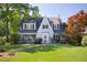 Inviting exterior view of home, with a well-manicured lawn, mature trees, and classic architectural details at 19 Oak Dr, Durham, NC 27707