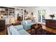 Inviting living room with built-in bookshelves and plenty of natural light at 19 Oak Dr, Durham, NC 27707
