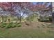The back of the property line is landscaped with brick columns and trees that provide privacy at 20 Paddy Ln, Youngsville, NC 27596