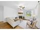 Inviting living room featuring a cozy fireplace and comfortable seating arrangement at 20 Paddy Ln, Youngsville, NC 27596