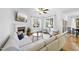 Cozy living room with fireplace, plush seating, and bright natural light at 20 Paddy Ln, Youngsville, NC 27596