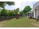 Large backyard with playset and trampoline, great for outdoor fun at 2013 Waterton Ln, Apex, NC 27502