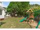 Spacious backyard with playset, offering plenty of room for activities at 2013 Waterton Ln, Apex, NC 27502