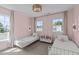 Bedroom featuring two beds and pink decor at 2013 Waterton Ln, Apex, NC 27502