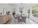 Charming dining room showcasing modern light fixture, and natural light at 2013 Waterton Ln, Apex, NC 27502