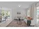 Bright living space featuring hardwood floors, neutral paint, and elegant decor at 2013 Waterton Ln, Apex, NC 27502