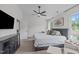 Bright main bedroom with ceiling fan, picture window, and neutral decor at 2013 Waterton Ln, Apex, NC 27502
