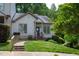 Charming home featuring a well-maintained lawn, attractive landscaping, and welcoming front porch at 205 Windbyrne Dr, Cary, NC 27513