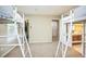 Shared ' bedroom featuring loft beds and multiple entries to other rooms at 216 Beringer Pl, Chapel Hill, NC 27516