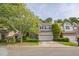 Charming two-story home with a two-car garage, manicured lawn and inviting curb appeal at 216 Beringer Pl, Chapel Hill, NC 27516