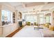 Bright living room with a fireplace, built-in shelving and furniture, and natural light at 216 Beringer Pl, Chapel Hill, NC 27516