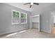 Cozy bedroom featuring carpeted floors and an open closet at 249 Rawhide Dr, Louisburg, NC 27549