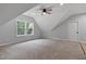 Bright, carpeted bedroom featuring a ceiling fan and natural light at 249 Rawhide Dr, Louisburg, NC 27549