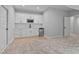 Stylish kitchenette featuring white cabinetry and stainless steel mini-fridge at 249 Rawhide Dr, Louisburg, NC 27549