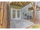 Concrete patio features a double French door walkout and a small window at 2705 Wyntercrest Ln, Durham, NC 27713