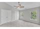 Bedroom with carpet, a ceiling fan, and large windows at 2705 Wyntercrest Ln, Durham, NC 27713