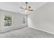 Bright bedroom features two windows and neutral carpet for a serene, comfortable atmosphere at 2705 Wyntercrest Ln, Durham, NC 27713