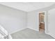 Bright bedroom with neutral carpet and an ensuite bathroom at 2705 Wyntercrest Ln, Durham, NC 27713