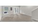 Bright bonus room with neutral carpet, fresh paint, and natural light at 2705 Wyntercrest Ln, Durham, NC 27713
