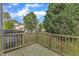 Wooden deck overlooking the neighborhood on a sunny day at 2705 Wyntercrest Ln, Durham, NC 27713