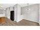 View of dining area featuring modern chandelier and gray walls at 2705 Wyntercrest Ln, Durham, NC 27713