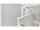 Upstairs hallway leading to laundry and bedrooms at 2705 Wyntercrest Ln, Durham, NC 27713