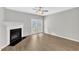 Living room featuring a fireplace and access to the patio at 2705 Wyntercrest Ln, Durham, NC 27713