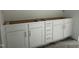 Modern bathroom with white cabinet and silver hardware awaiting countertop at 2874 Quarry Rd # 165, Rolesville, NC 27571