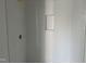 Elegant bathroom featuring modern white tiles and a recessed niche at 2874 Quarry Rd # 165, Rolesville, NC 27571