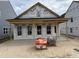 New home construction shows the framing and exterior materials before siding and finishing are installed at 2874 Quarry Rd # 165, Rolesville, NC 27571