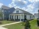 Charming single-story home with a welcoming front porch and beautifully landscaped yard at 2874 Quarry Rd # 165, Rolesville, NC 27571