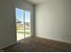 Bright living room with sliding glass doors opening to the backyard at 2874 Quarry Rd # 165, Rolesville, NC 27571