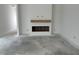 Living room featuring a modern fireplace with a light wood mantel at 2874 Quarry Rd # 165, Rolesville, NC 27571