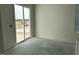 Living space with sliding glass doors leading to the outside at 2874 Quarry Rd # 165, Rolesville, NC 27571