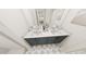 Modern bathroom with double vanity, stylish tile flooring, and a separate shower at 2911 Alyssa Ct, Raleigh, NC 27604