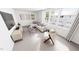 Bright and airy living room with large windows, comfortable seating, and modern decor at 2911 Alyssa Ct, Raleigh, NC 27604