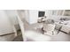 Spacious living room with modern furniture, ample seating, and a view of the staircase at 2911 Alyssa Ct, Raleigh, NC 27604