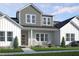 Charming two-story home featuring board and batten siding and a welcoming covered front porch at 2915 Alyssa Ct, Raleigh, NC 27604