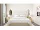 Serene bedroom with neutral decor, a plush bed, and ambient lighting at 312 Calvander Ln, Apex, NC 27539