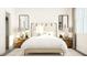 Cozy bedroom with ample natural light, decorative mirrors, and stylish lamps at 312 Calvander Ln, Apex, NC 27539
