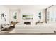 Spacious living room with neutral tones, fireplace, and picturesque outdoor views at 312 Calvander Ln, Apex, NC 27539
